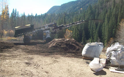 Biochar being applied over mine site