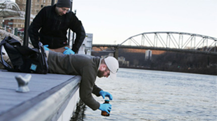 Sampling Elk River surface water near water treatment plant near Charleston, WV