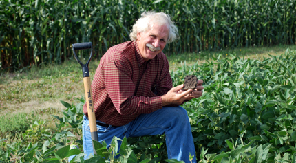 David Clay inspecting soil quality in South Dakota