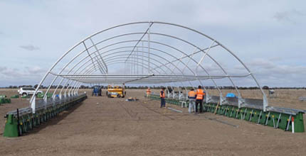 Experimental field with portable rainout shelter