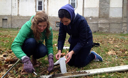 Gathering soil sample on Chicago's South Side.