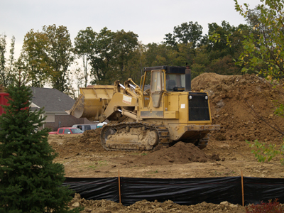 Frontloader on home construction site