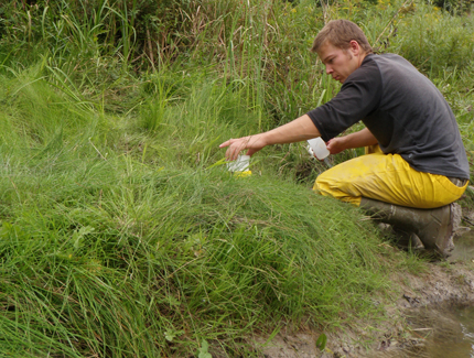 Collecting groundwater seep sample