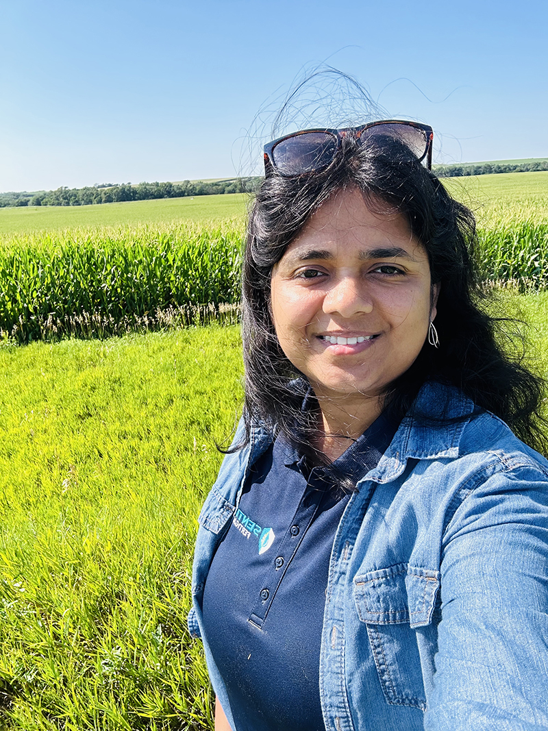 Ishani Lal scouting a corn field 