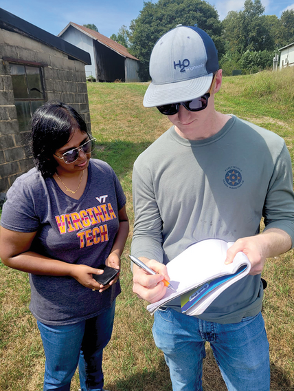 Virginia Tech researcher Shreya Mitra (left) seeks farmer Morgan Welch's advice and feedback on developing a research toll that will elicit risks and rewards for farmers to transition toward sustainability. Photo courtesy of Maaz Gardezi.